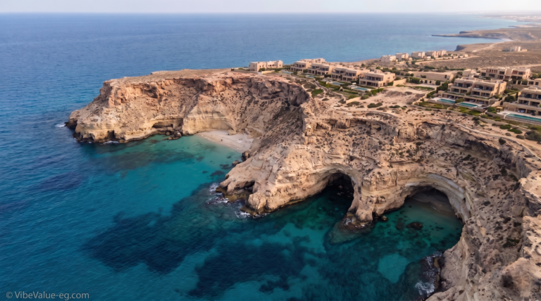 High-resolution aerial view showing the dramatic topography of the Ageeba Plateau development zone and its limited, exclusive construction sites overlooking the sea